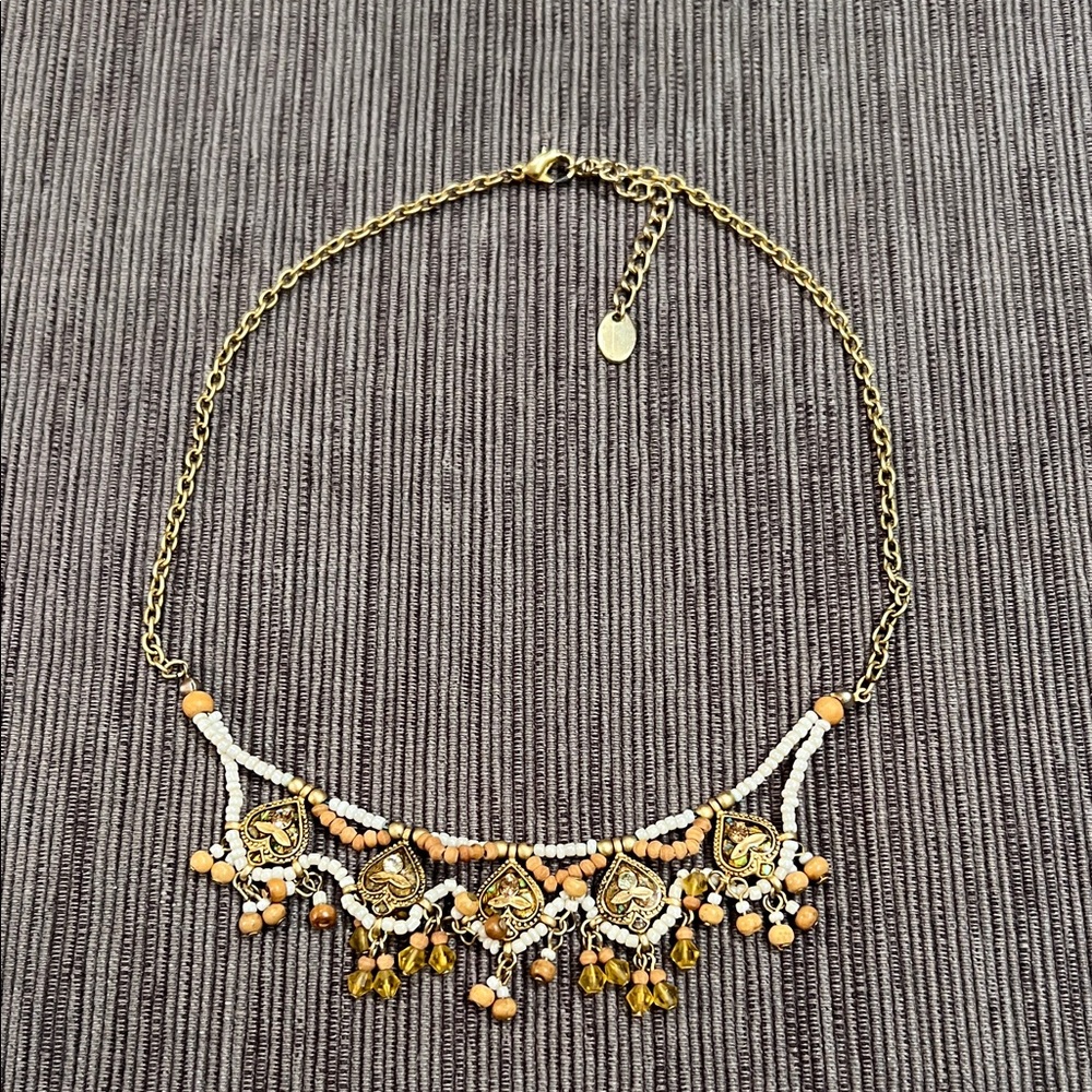 Elegant Gold and White Necklace